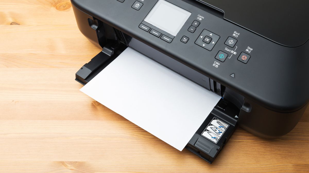 Máy in bị nhòe mực liên quan đến giấy in